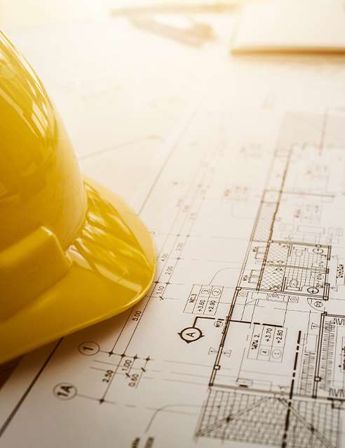 hardhat on blueprints