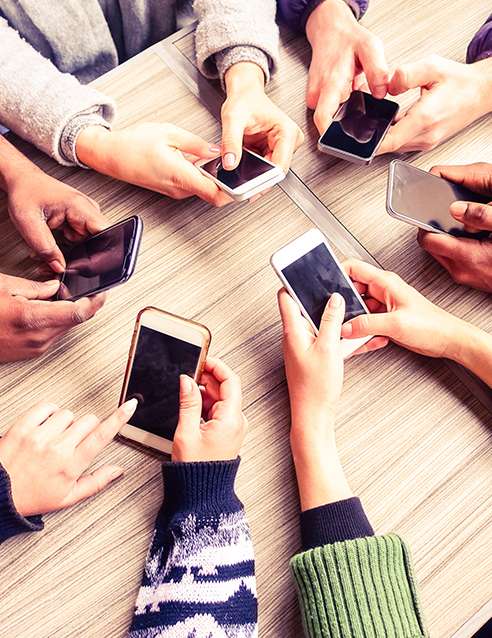 group of people with mobile phones