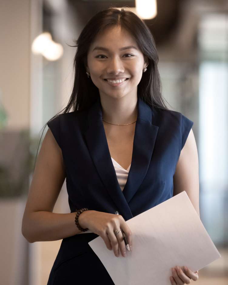 woman holding acb careers application