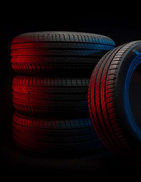 stack of tires under red lighting